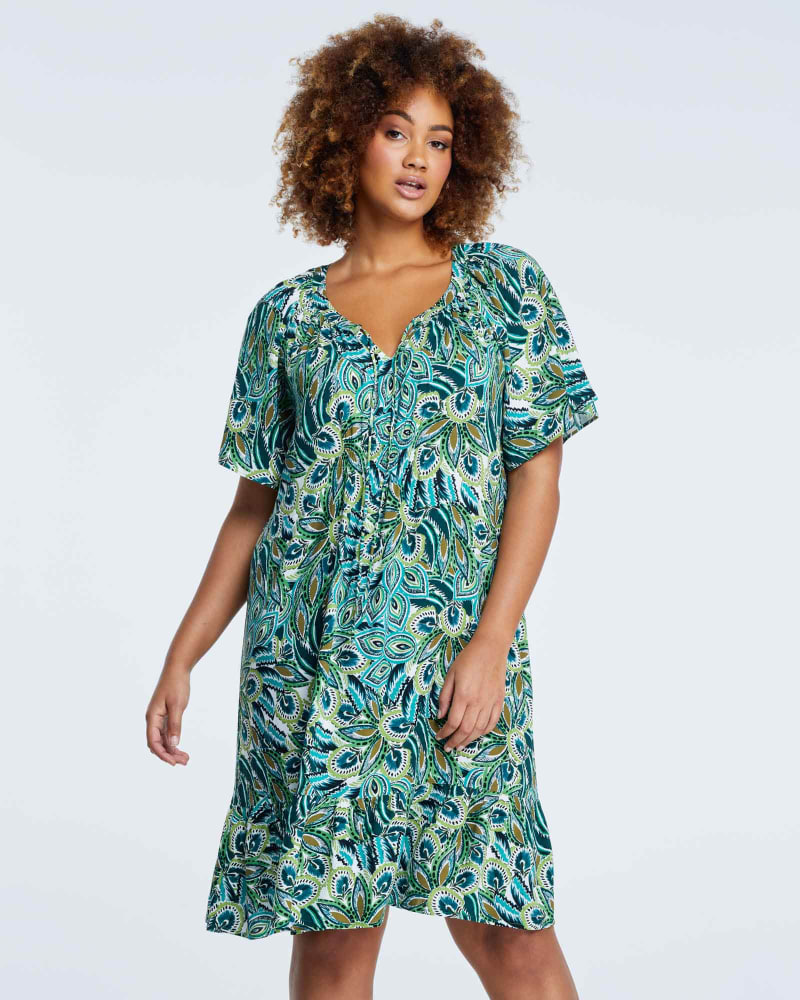 Front of a model wearing a size 2X Peacock Dress in Print by Estelle. | dia_product_style_image_id:264837